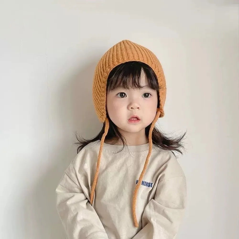 Conjunto bebé jersey de punto y gorro con protección auditiva - imagen 3
