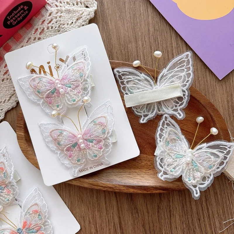 Pinza mariposa bordada con perla – Elegante accesorio pelo niña - imagen 4