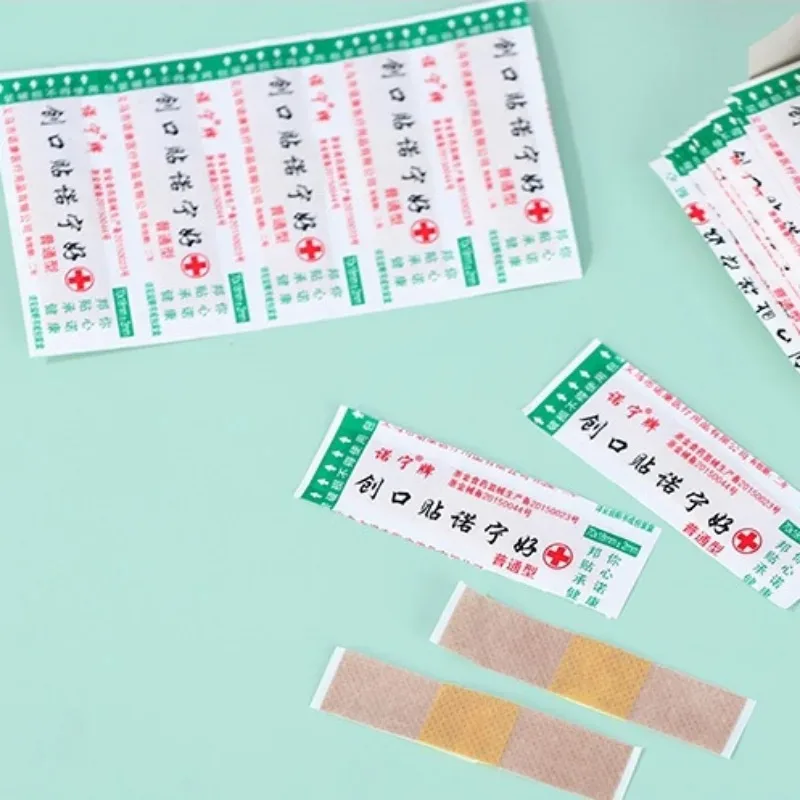 50 Uds tirita de yeso transpirable tiras de primeros auxilios parche de vendaje para heridas para el cuidado de la piel vendajes adhesivos Woundplast - imagen 4