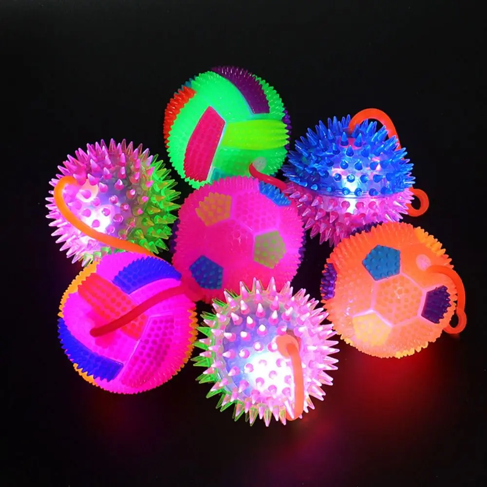 Bola antiestrés luminosa LED exprimible con masaje suave intermitente - imagen 5