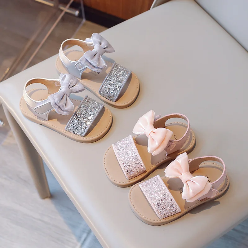 Sandalias de moda para niña, novedad de verano, zapatos para niños, zapatos de princesa, zapatos antideslizantes de suela blanda para niña, sandalias de playa con lentejuelas y lazo, zapatos para niña