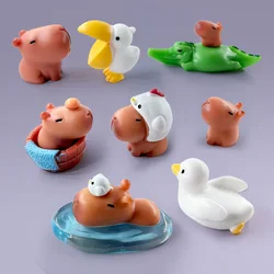 Juego de figuras de animales para montar: pato, cocodrilo y capibara