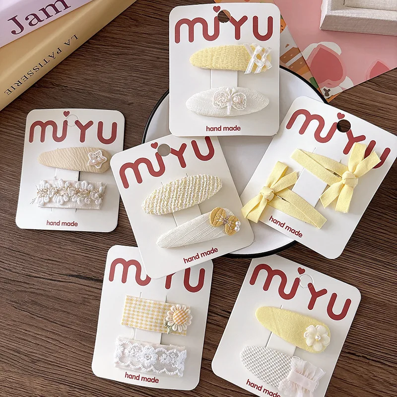 Clips de pelo con lazo de encaje beige para niñas y bebés - imagen 3