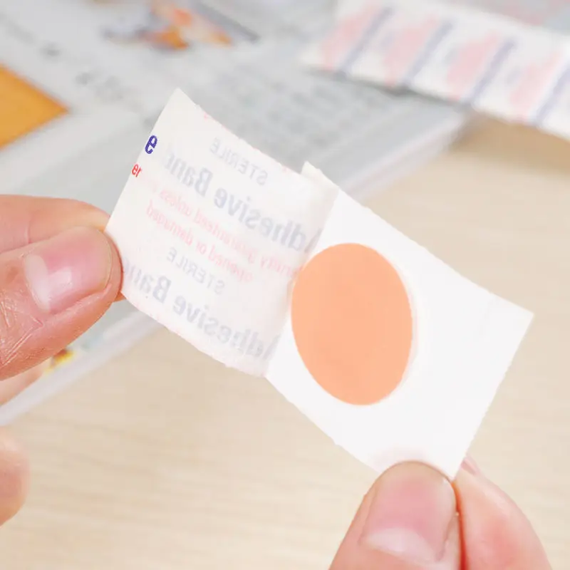Mini banda de ayuda impermeable para vendaje de heridas pequeñas, cinta médica adhesiva redonda para fijación de heridas, 100 piezas - imagen 2