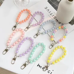 Correa para iPhone 14 color caramelo – cordón pulsera y mochila