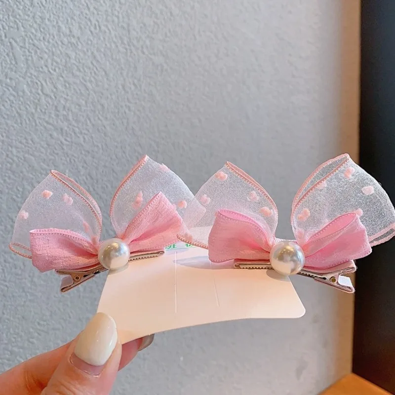 Pinzas con lazo de perlas y orejas de conejo para niñas - imagen 2