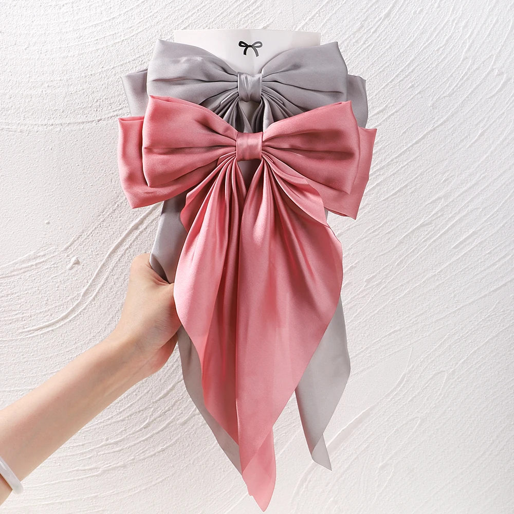 Pinza de pelo con lazo de raso para niña – Elegante