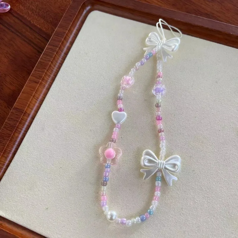 Cordón teléfono perlas cristal lazo – Cinta antipérdida mujer - imagen 5