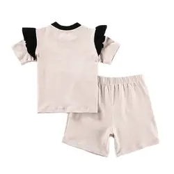 Conjunto bebé top de algodón, pantalón corto con botones y volantes