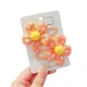orange sequin flower