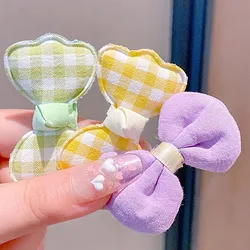 Horquillas de goma con flores para niñas