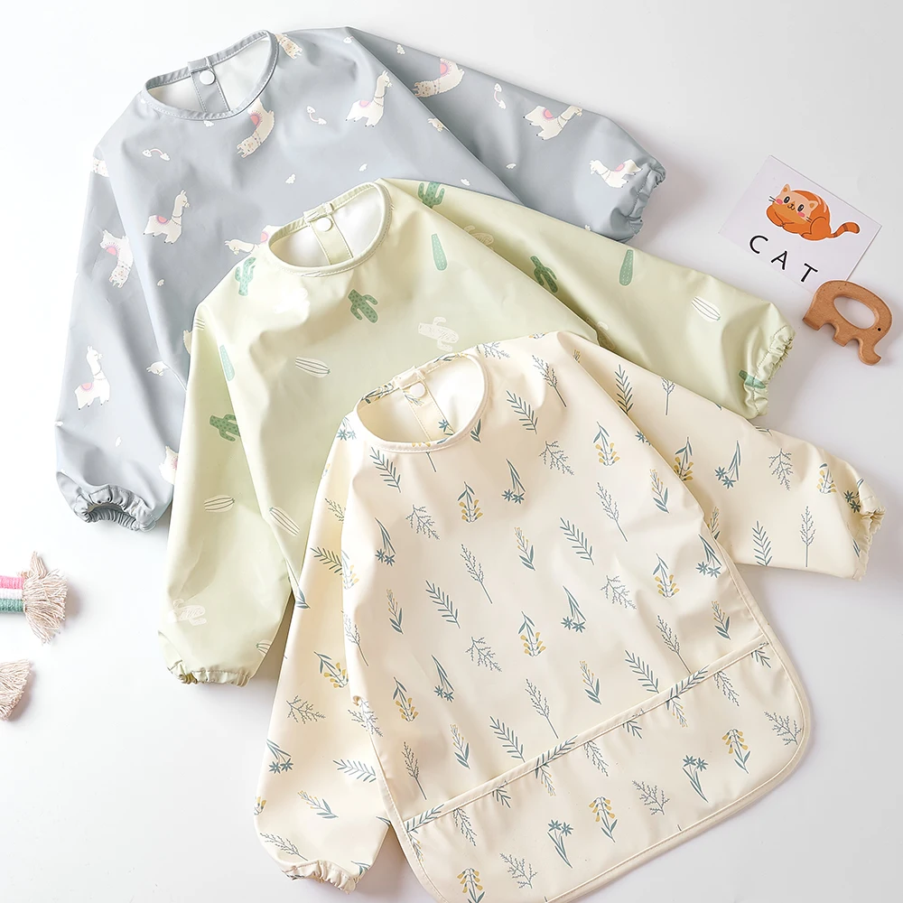 HappyFlute-mono danés de tela PU de alta calidad, nuevo estilo, bonito, impermeable, de manga larga, con broche, bolsillo grande, babero de alimentación sin suciedad - imagen 2