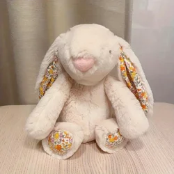 Conejo de peluche suave y tierno para niños