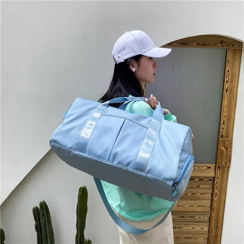 Bolsas de viaje de moda para mujer, bolso deportivo de gran capacidad para hombre, bolso de fin de semana impermeable, bolso de mensajero femenino de viaje seco y húmedo