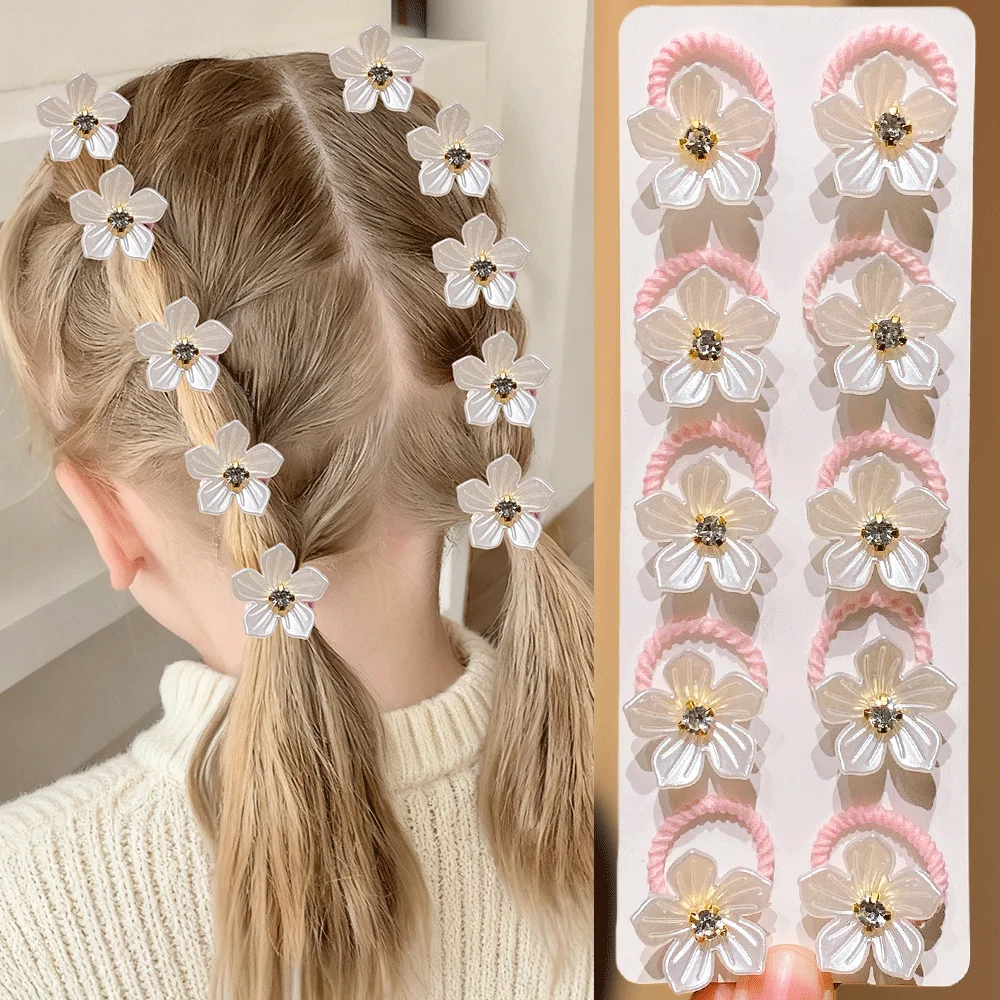 Gomitas elásticas para niña con pedrería y diseño floral - imagen 2
