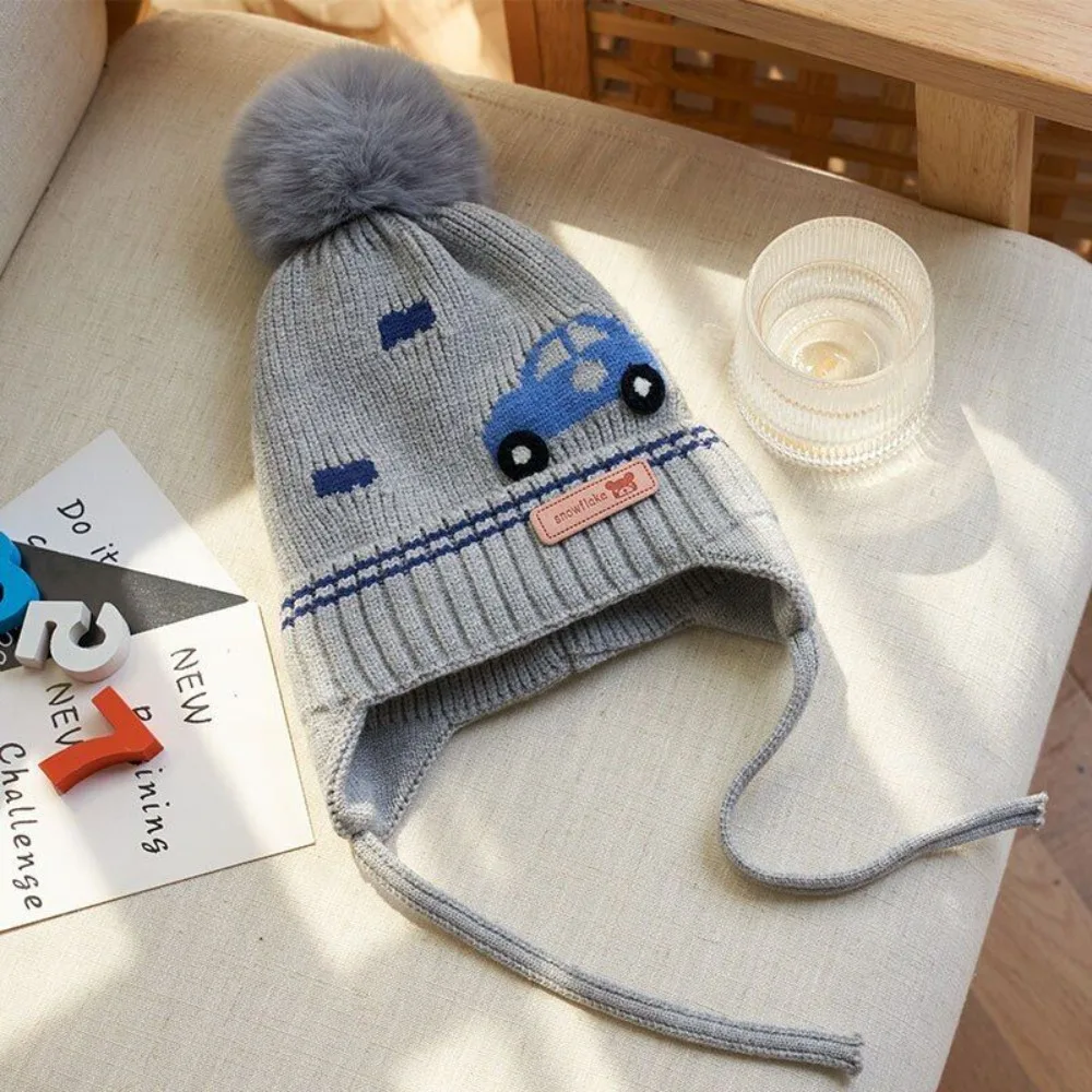 Gorro de dinosaurio tejido con orejeras para bebé y niño invierno - imagen 4