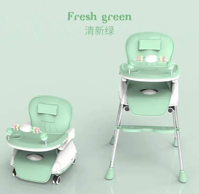 Una silla de bebé verde con asiento blanco