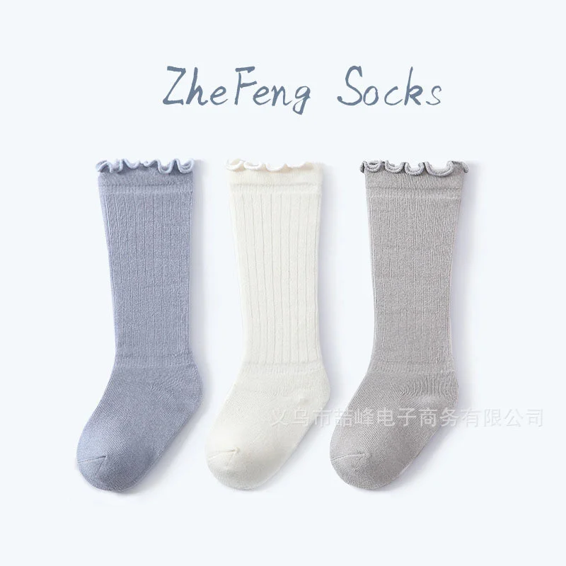 Medias de algodón de Color sólido para niñas y niños, medias suaves de princesa para Yoga hasta la rodilla, tiras largas, calcetines con volantes, ropa barata