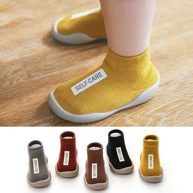 Zapatos antideslizantes de suela blanda para primeros pasos de bebé