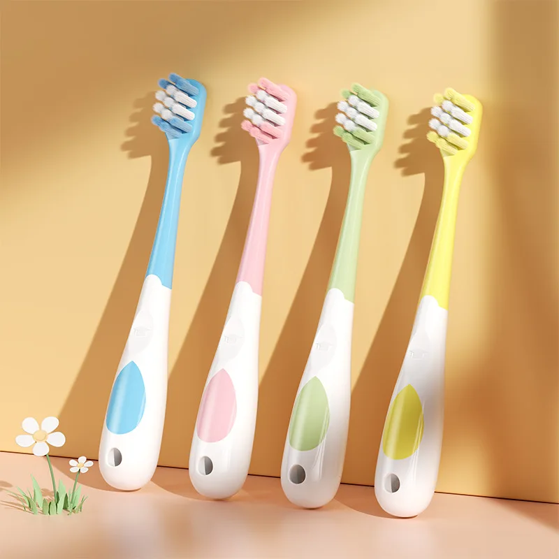 Cepillo de dientes infantil antideslizante de cerdas suaves