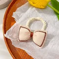 beige bow