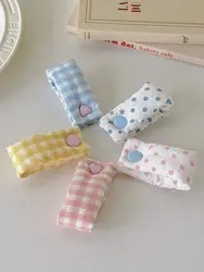 Bridas de tela reutilizables para cables de auriculares infantil