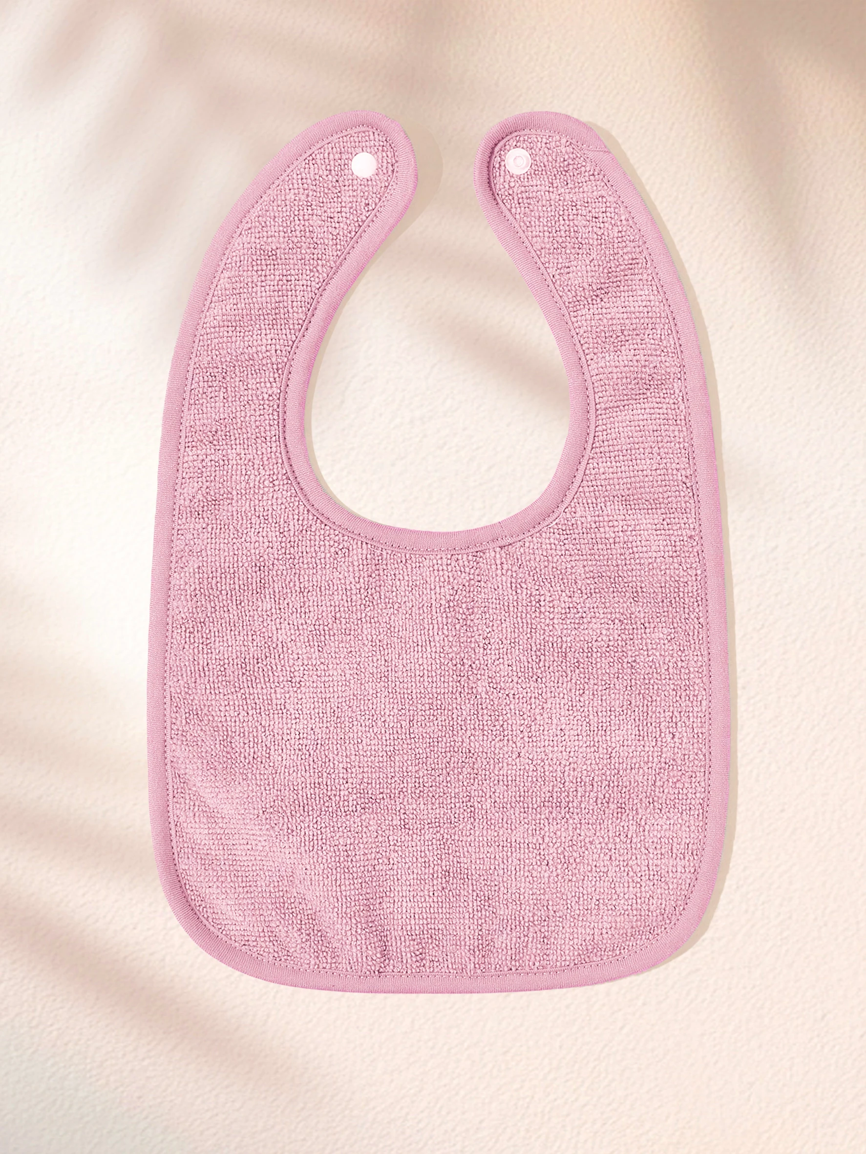 Babero bebé unisex suave y absorbente con botón