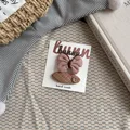 Butterfly button