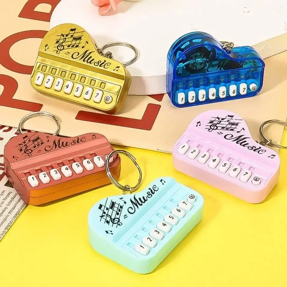 Mini llavero piano electrónico con luces y sonidos para niños