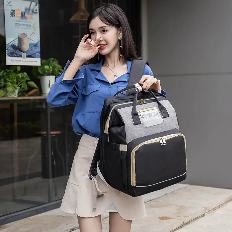 EG191 Bolsa de mamá de gran capacidad, mochila plegable para cama de bebé, bolsa de pañales multifunción, bolsa de lactancia para mamás - imagen 4