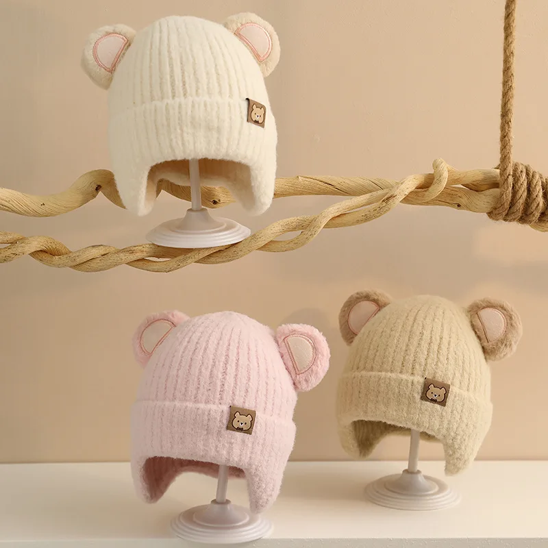 Orejeras ajustables con diseño de oso