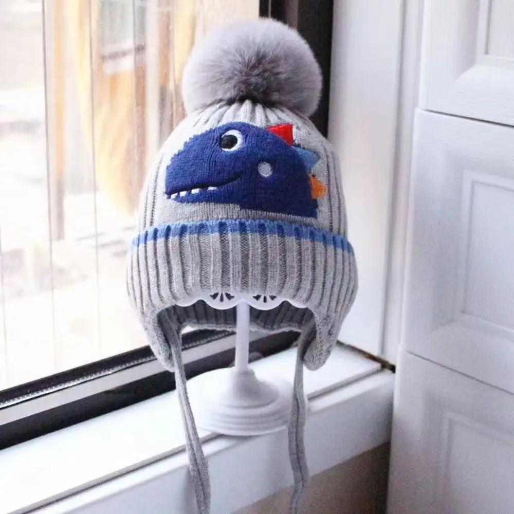Gorro de dinosaurio tejido con orejeras para bebé y niño invierno - imagen 2