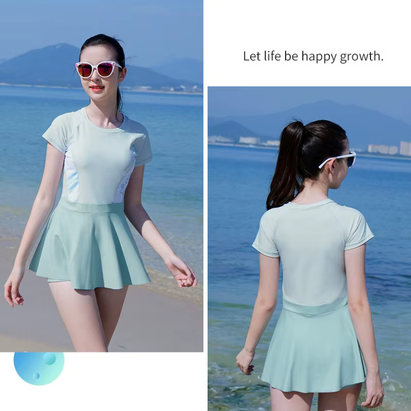 Traje de baño niña una pieza con falda, pantalones cortos y retales - imagen 4