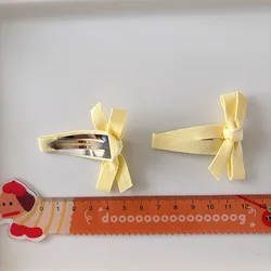 Clips de pelo con lazo de encaje beige para niñas y bebés