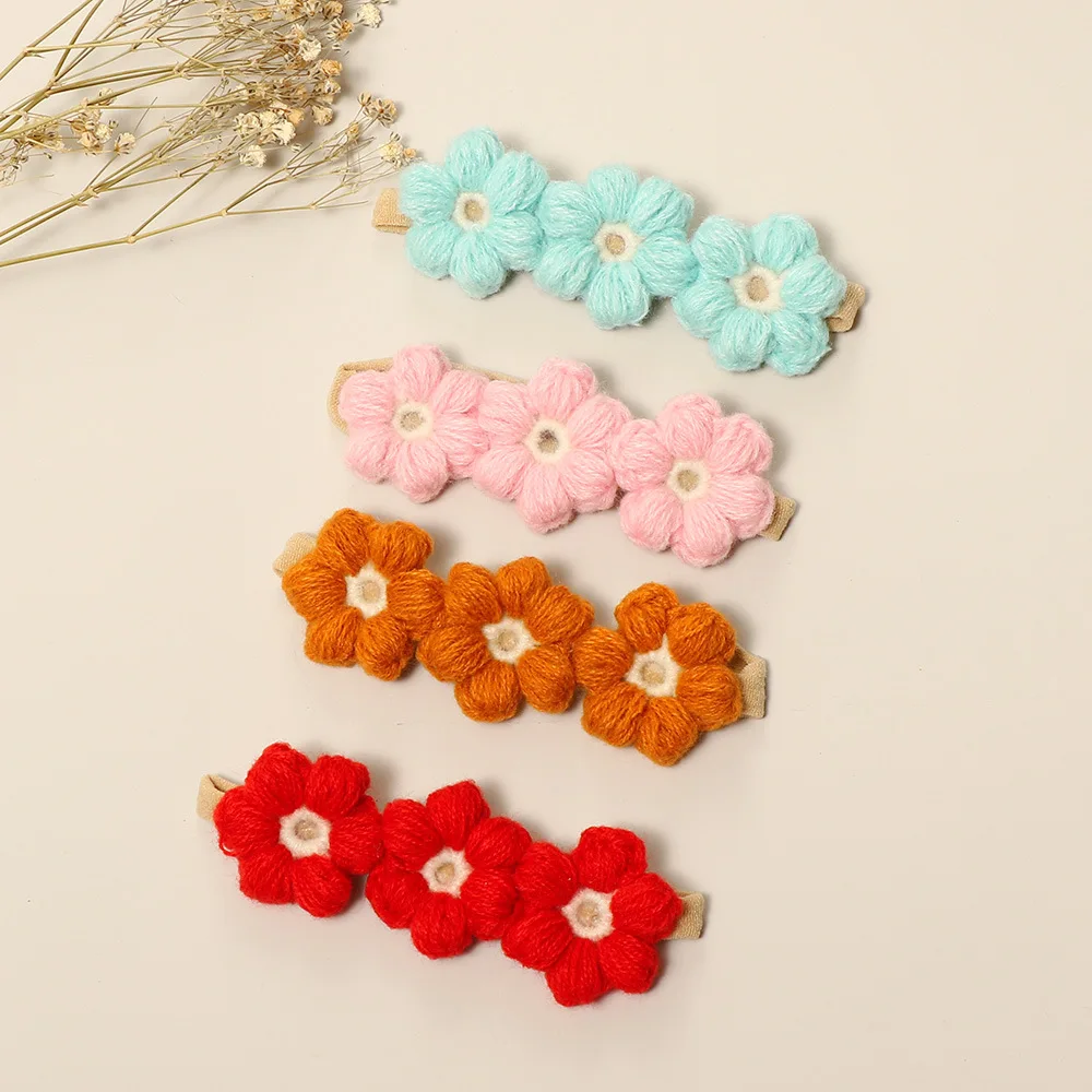 Diadema bebé lana con flores tejida artesanal - imagen 2
