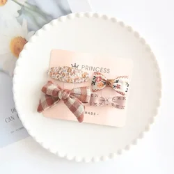 Clips de pelo con lazo floral para niña – Complemento infantil