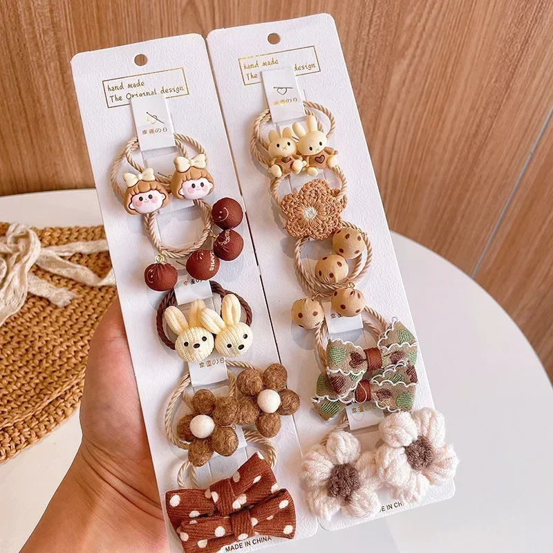 Lindo lazo de flores de dibujos animados niños pequeño Scrunchie bebé niña chico elástico de goma para el cabello accesorios corbata anillo para el cabello tocado de cuerda - imagen 3