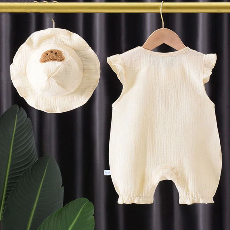 Conjunto recién nacido de muselina: mameluco y gorrito oso
