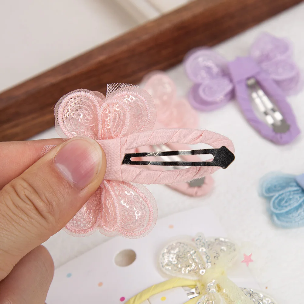 Pinzas de pelo con mariposa y lentejuelas para niña - imagen 5