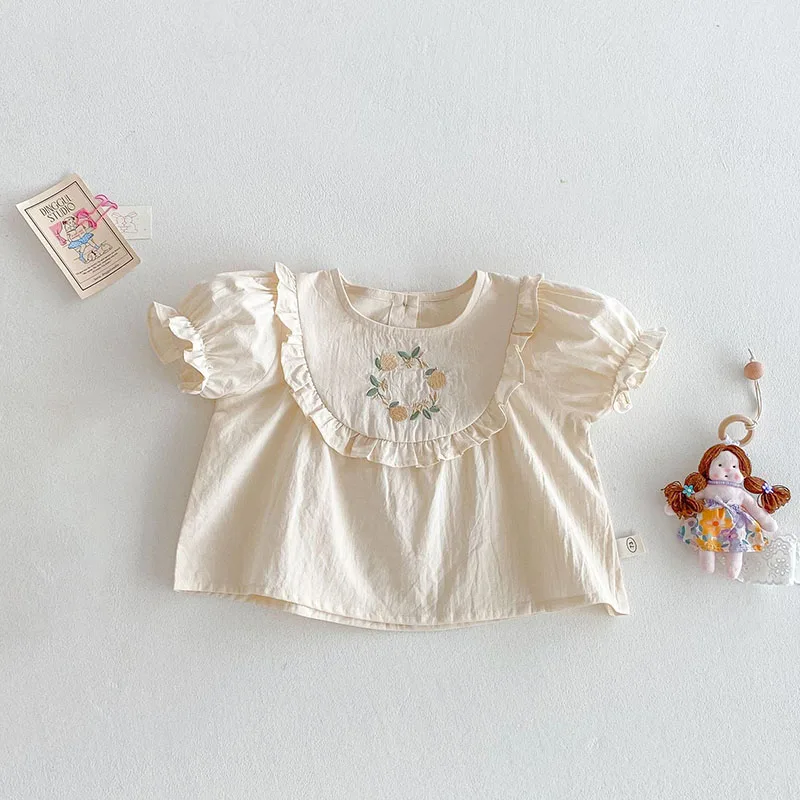 beige shirt