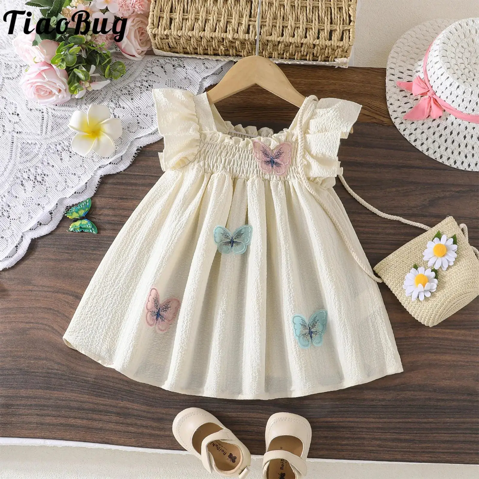 Vestido veraniego para niñas con mariposa y mangas volantes