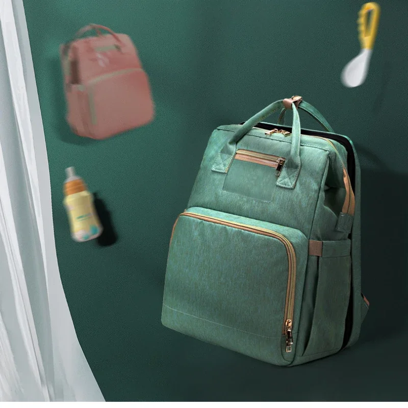 Bolsa de pañales plegable EG98 con cama de bebé, mochila multifunción impermeable para maternidad, mochila para bebé lista para viajar, porta pañales portátil