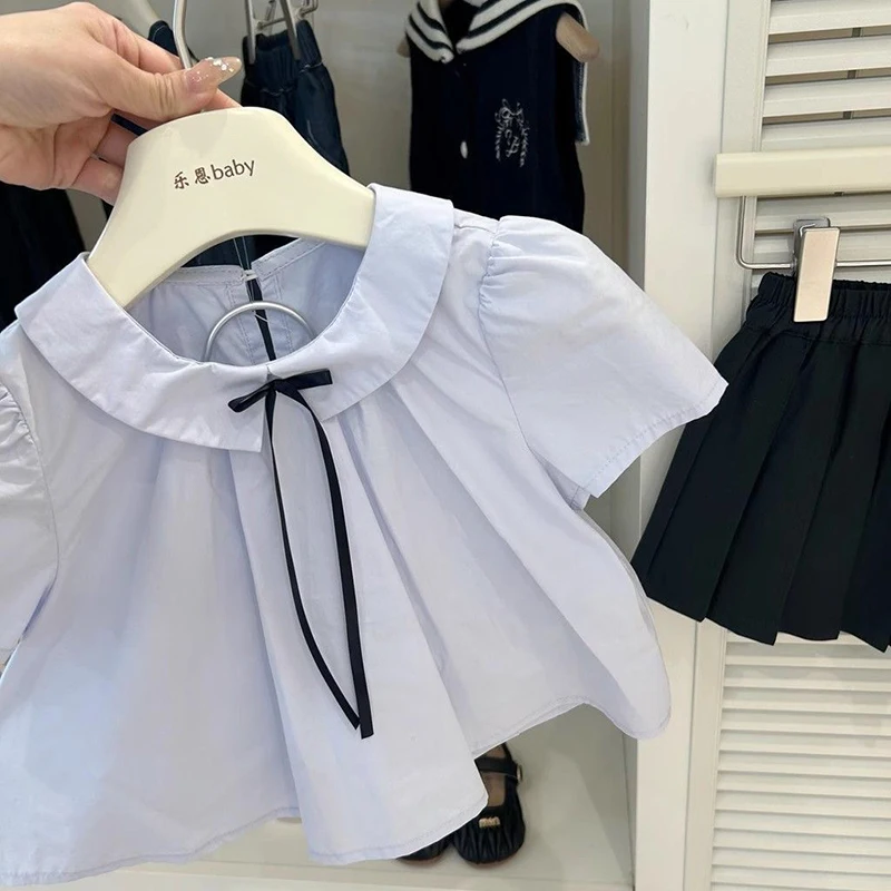 2025 Conjunto de falda plisada de Color sólido de estilo universitario para niñas de primavera y verano, camisa de manga corta de verano, conjunto de dos piezas con estilo - imagen 3