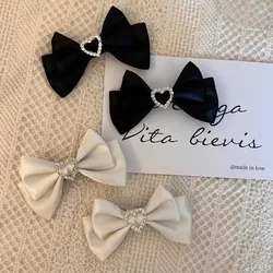 Pinzas pelo niña con lazo corazón - Clips doble punta diamante