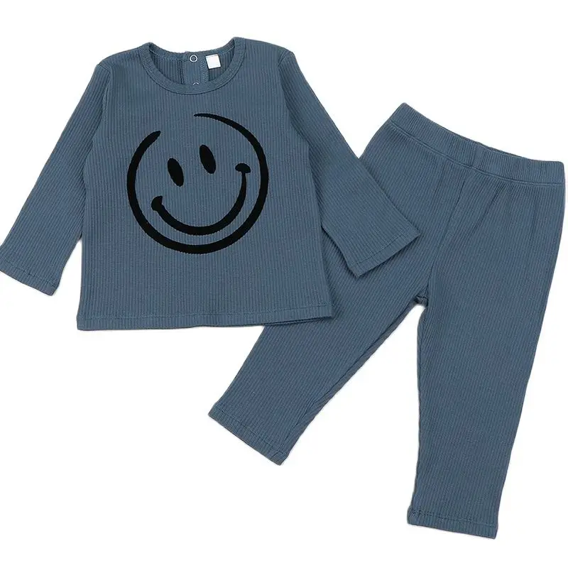 Conjunto de pijama acanalado para niño y niña, ropa de cuello redondo, top y pantalones, invierno, sonrisa flocada, 2 piezas