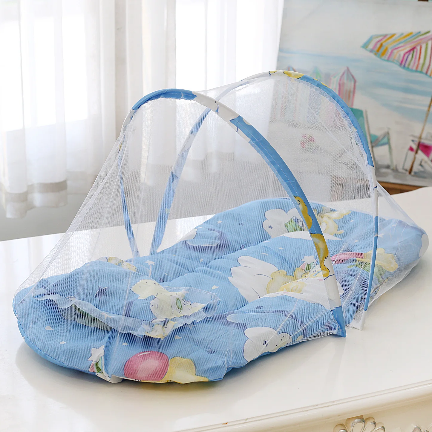 Mosquitera plegable para cuna con colchón y almohada