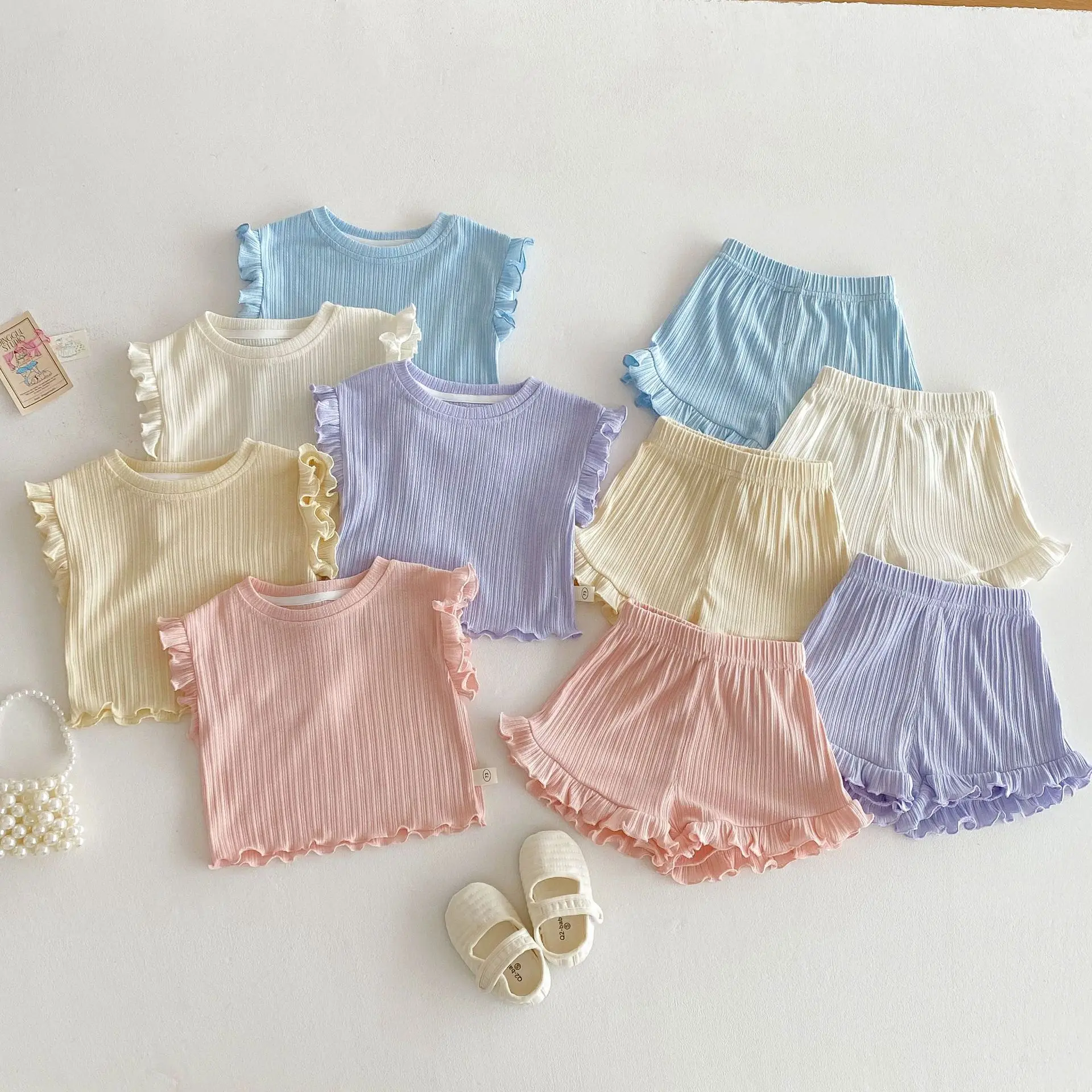 MILANCEL, conjuntos de camisetas sin mangas para niñas, chaleco con volantes de Color sólido para niños, pantalones cortos, traje de 2 uds, trajes de verano para bebés, ropa para niños - imagen 2
