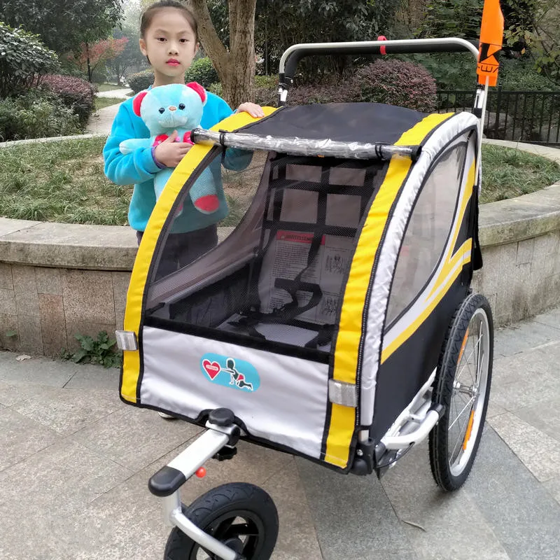 Remolque infantil para bicicleta dos en uno con ruedas inflables - imagen 3