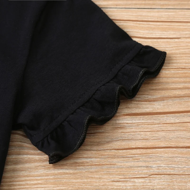 Lavado de la camiseta de algodón para niña