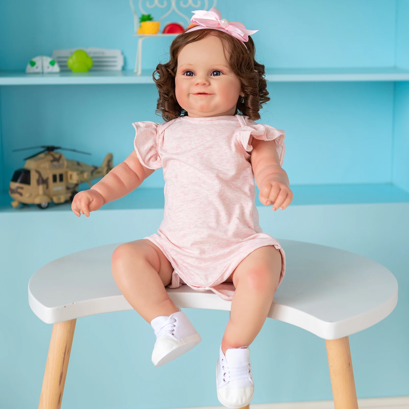 Muñeca Reborn con pelo marrón y detalles
